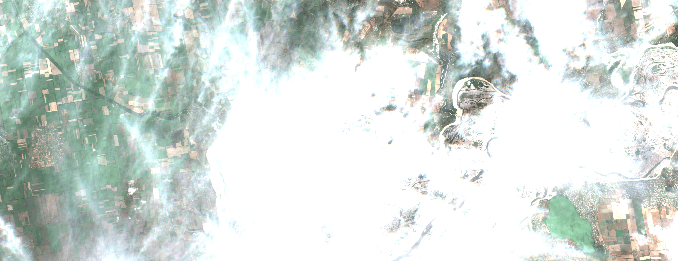Cloudy Sentinel-2 image over drained river